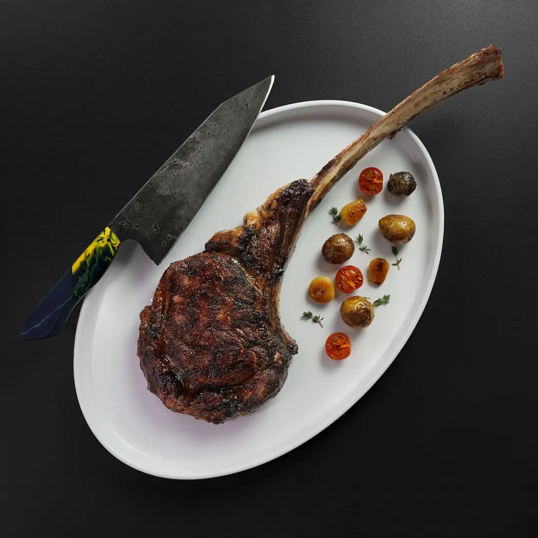 A long-bone standing rib on butcher paper